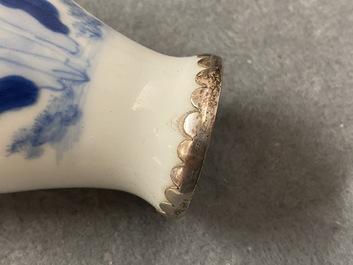 Three Chinese silver-mounted blue and white vases and a teapot, Kangxi